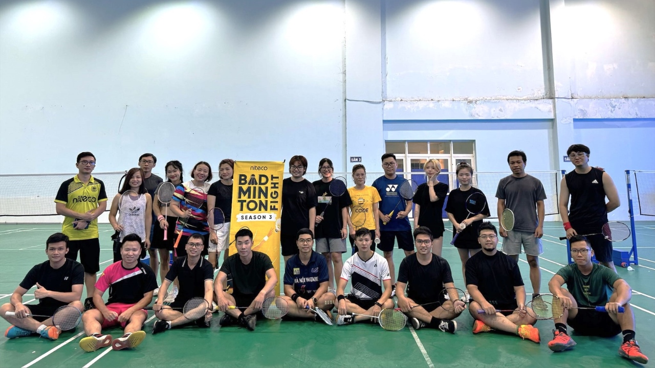 Badminton Fight Season 3 participants posing with rackets on court indoors