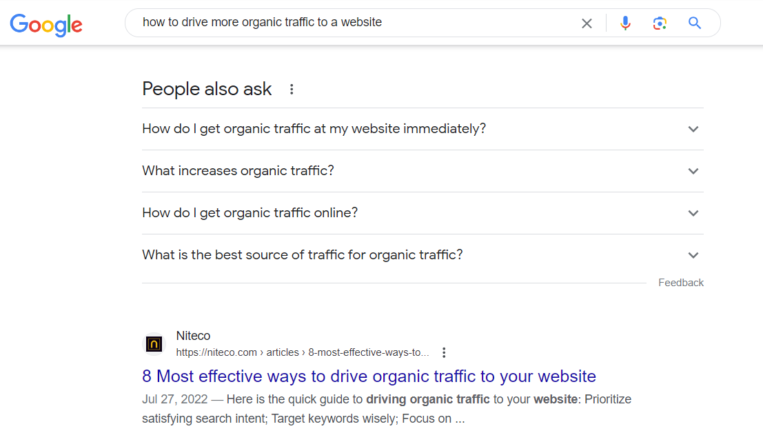 Google search results for how to drive more organic traffic to a website with related questions.