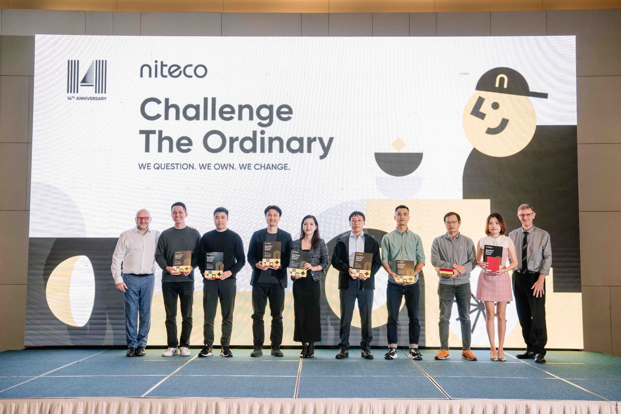 Niteco 14th anniversary awards ceremony with Challenge The Ordinary banner