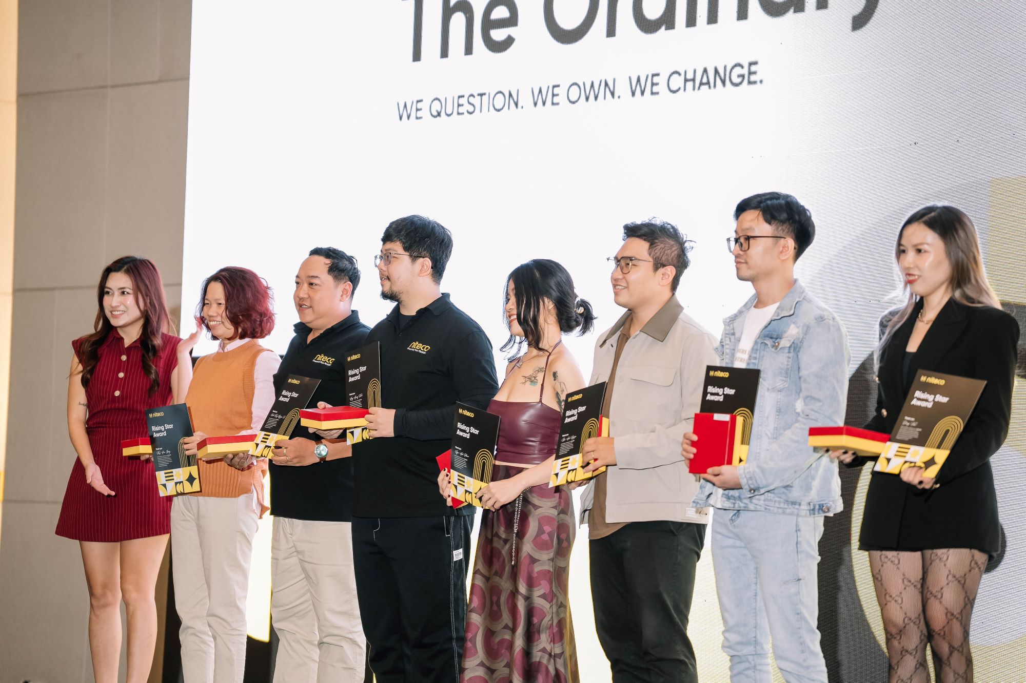 Winners receiving Rising Star Award at The Ordinary event with tagline "We Change