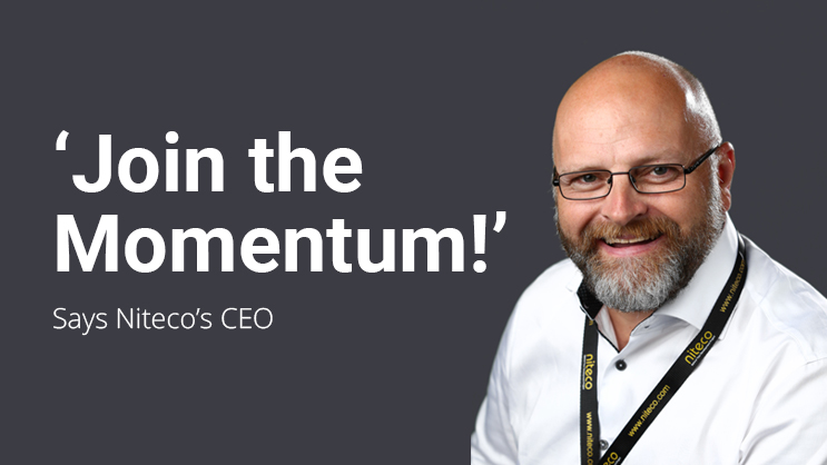 Niteco CEO inviting to Join the Momentum with a confident smile