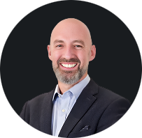 Smiling professional man in suit representing leadership and business expertise