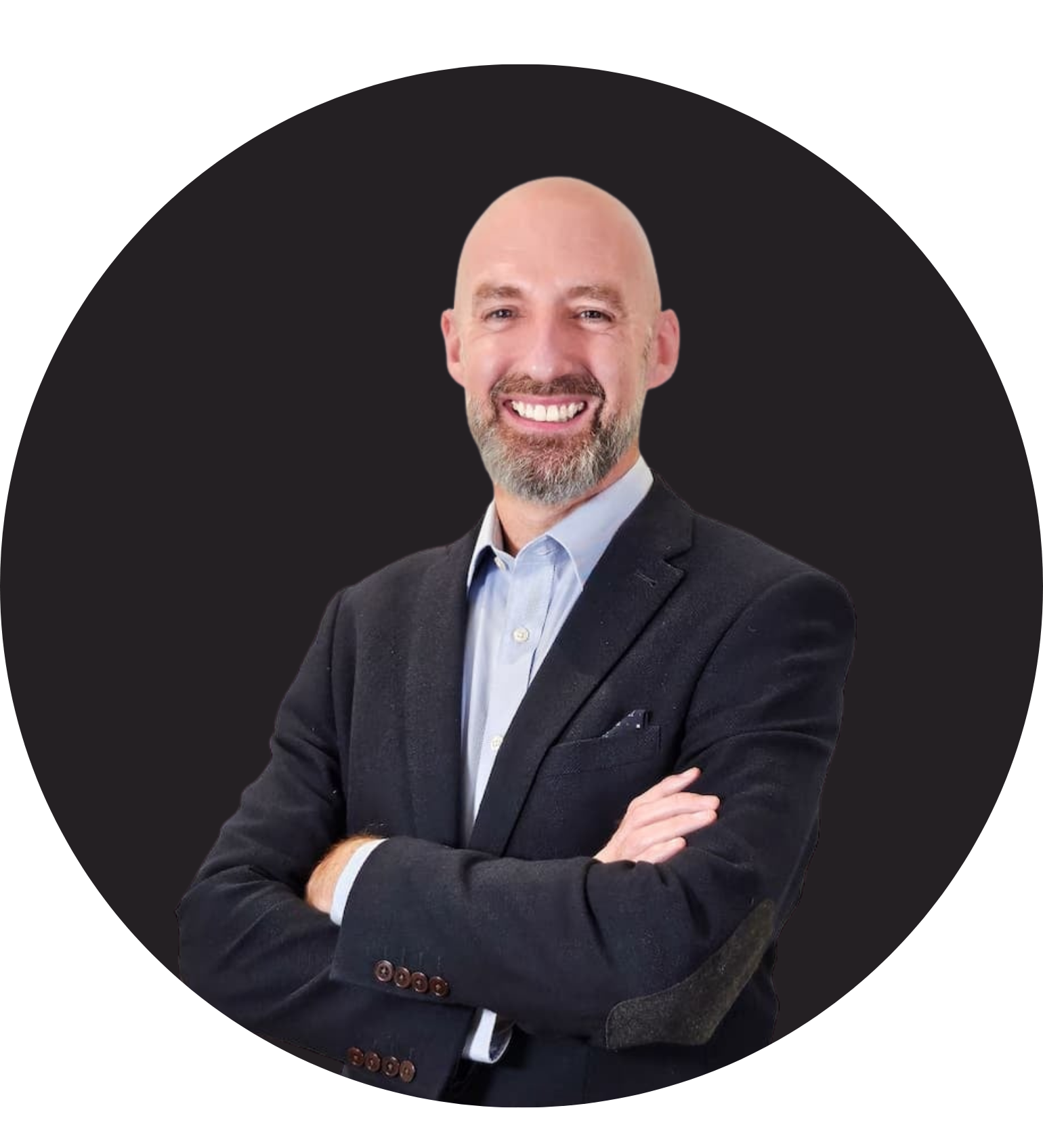 Smiling bald man in business suit with arms crossed on black background